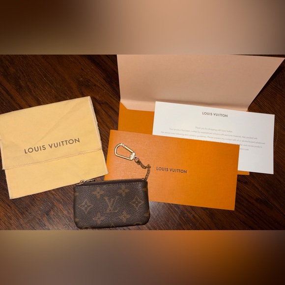 Louis Vuitton Handbags - Louis Vuitton Key Pouch in signature Monogram coatedcanvas,aka the Pochette Clés